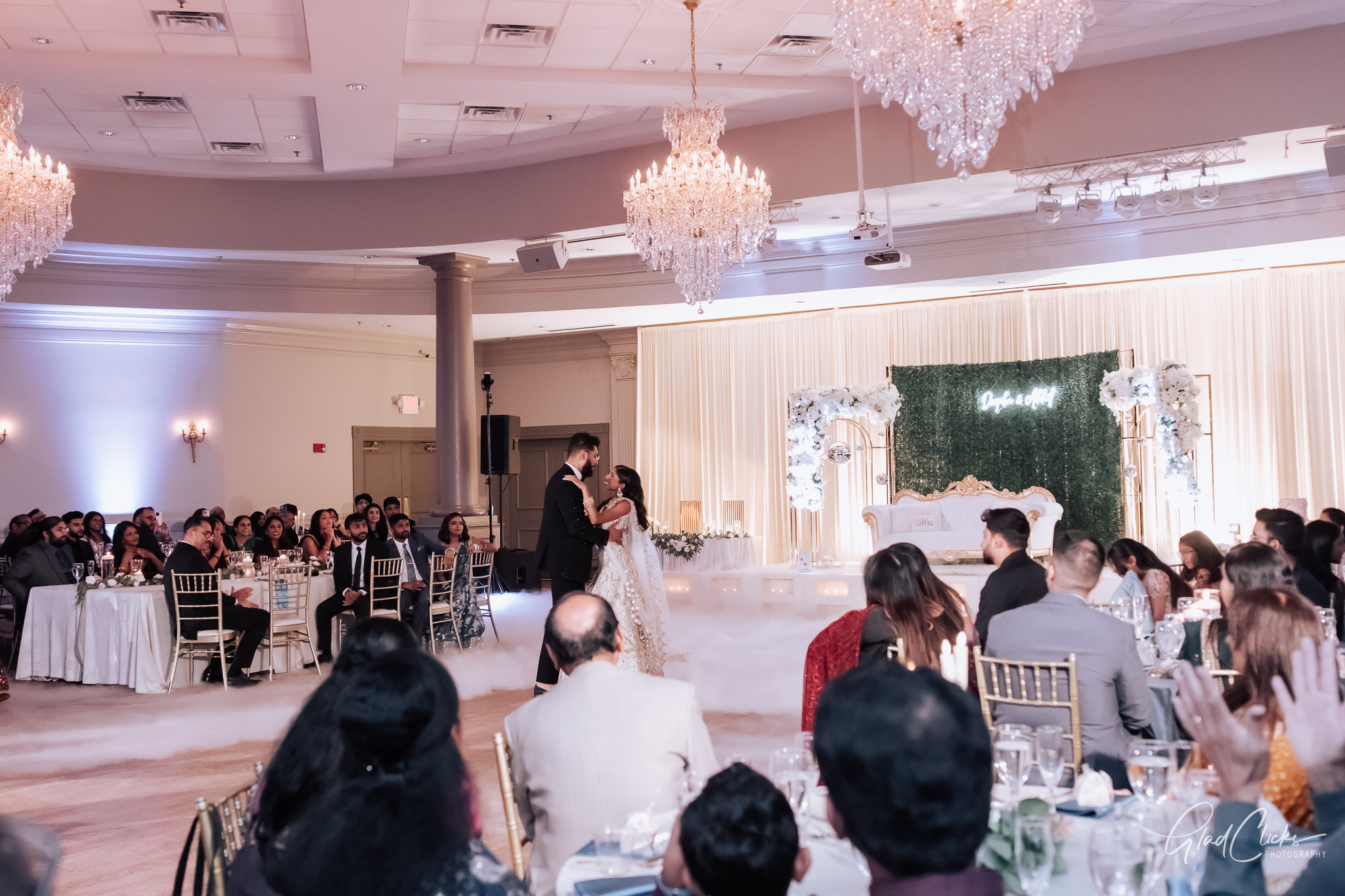 Decorated Atlanta wedding reception venue with dance floor and guest seating